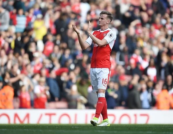 Arsenal's Rob Holding Celebrates with Fans after Victory over Manchester United