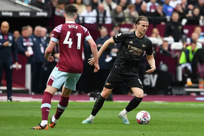 Framed Print : Arsenal's Rob Holding Charges Forward in Premier League Clash Against West Ham United Framed Print : Arsenal's Rob Holding Charges Forward in Premier League Clash Against West Ham United