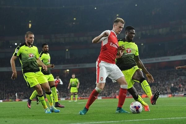 Arsenal's Rob Holding Clashes with Reading's Tyler Blackett in EFL Cup Showdown