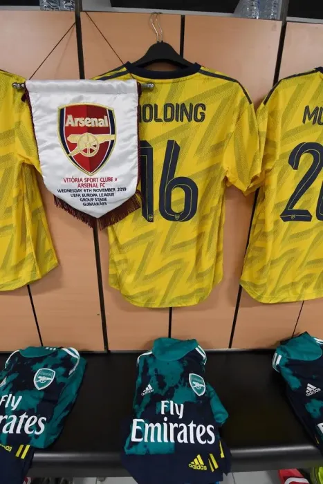 Framed Print : Arsenal's Rob Holding Displays Europa League Pennant Ahead of Vitoria Guimaraes Clash Framed Print : Arsenal's Rob Holding Displays Europa League Pennant Ahead of Vitoria Guimaraes Clash