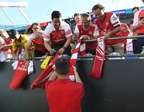 Arsenal's Rob Holding Engages with Excited Fans Before Arsenal v Fiorentina in 2019 International Champions Cup