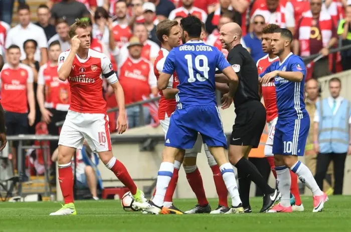 Framed Print : Arsenal's Rob Holding Faces Off Against Diego Costa in FA Cup Final Showdown Framed Print : Arsenal's Rob Holding Faces Off Against Diego Costa in FA Cup Final Showdown