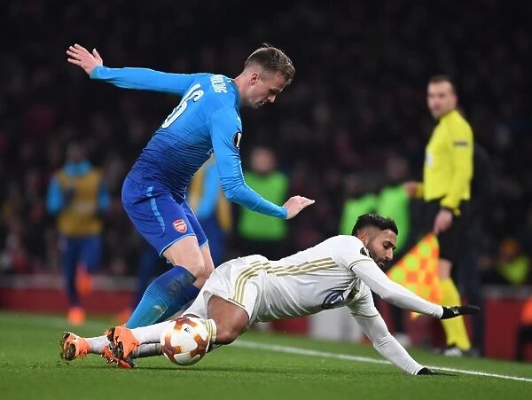 Arsenal's Rob Holding Faces Off Against Östersunds Saman Ghoddos in Europa League Clash