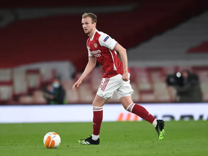 Framed Print : Arsenal's Rob Holding Focuses Amid Empty Emirates Stadium: Arsenal vs Slavia Praha, UEFA Europa League Quarterfinal (2021) Framed Print : Arsenal's Rob Holding Focuses Amid Empty Emirates Stadium: Arsenal vs Slavia Praha, UEFA Europa League Quarterfinal (2021)