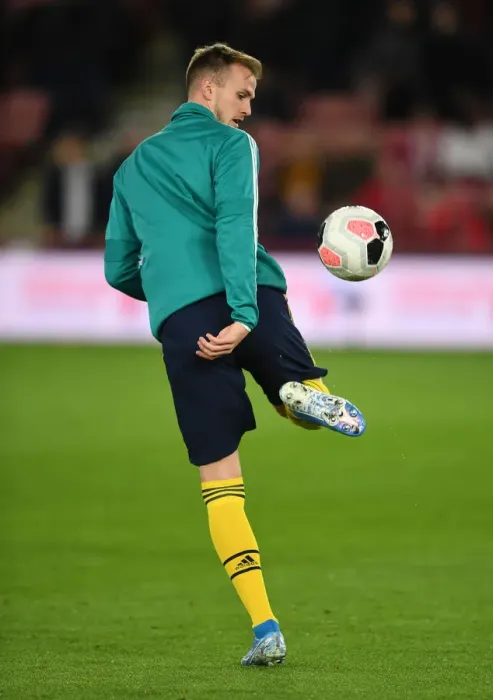 Framed Print : Arsenal's Rob Holding Gears Up for Sheffield United Clash in Premier League (2019-20)