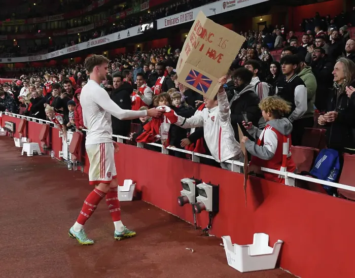 Framed Print : Arsenal's Rob Holding Gifts Shirt to Fan after Carabao Cup Win vs Brighton & Hove Albion