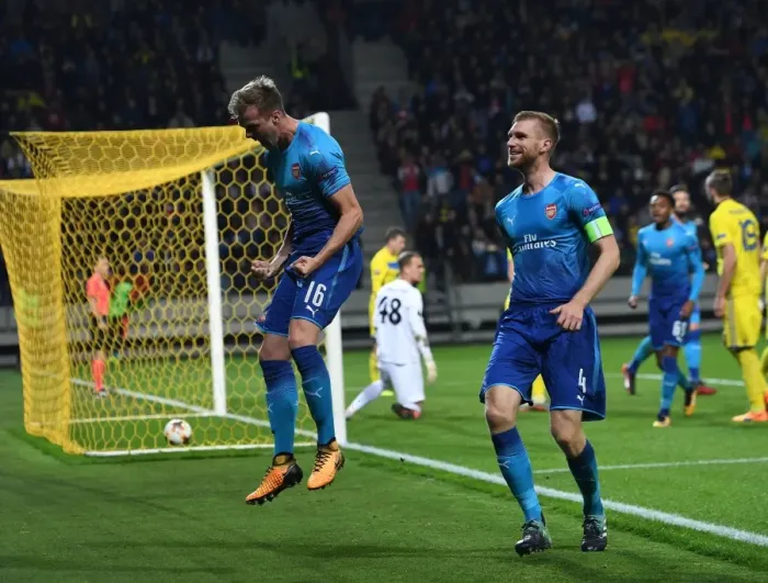 Framed Print : Arsenal's Rob Holding and Per Mertesacker Celebrate Goal Against BATE Borisov in Europa League