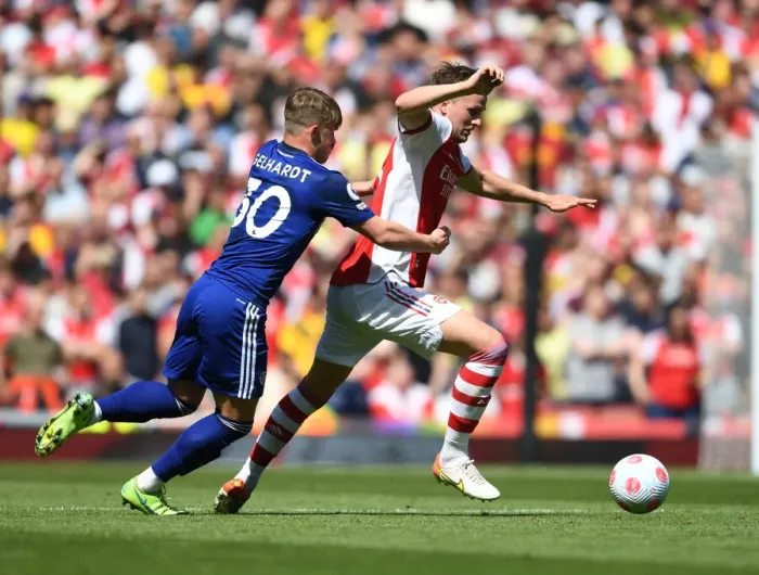 Framed Print : Arsenal's Rob Holding Overpowers Leeds Gelhardt in Intense Premier League Clash Framed Print : Arsenal's Rob Holding Overpowers Leeds Gelhardt in Intense Premier League Clash