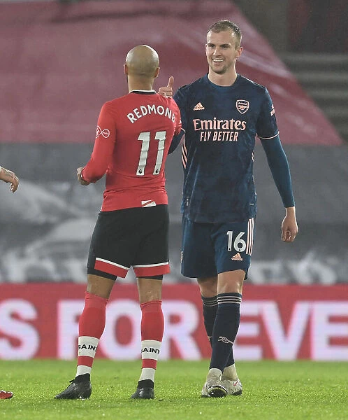 Arsenal's Rob Holding and Southampton's Nathan Redmond Exchange Handshakes in Empty St. Mary's Stadium - Southampton vs Arsenal, 2021 Premier League