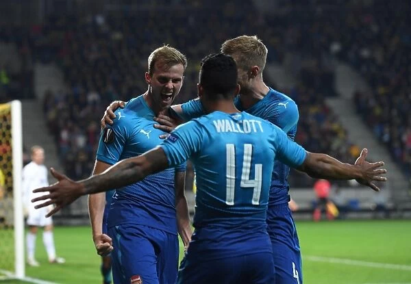 Arsenal's Rob Holding and Theo Walcott Celebrate Goal against FC BATE Borisov in Europa League