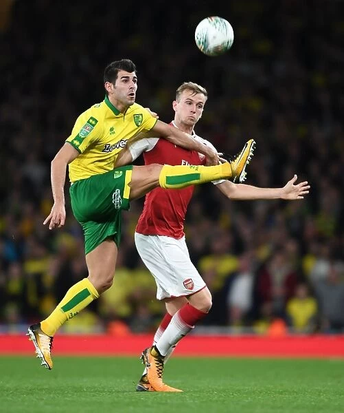 Arsenal's Rob Holding vs. Norwich's Mario Vrancic: A Carabao Cup Showdown at Emirates Stadium