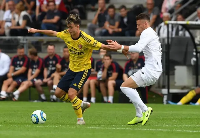 Framed Print : Arsenal's Robbie Burton in Action during Pre-Season Friendly against Angers