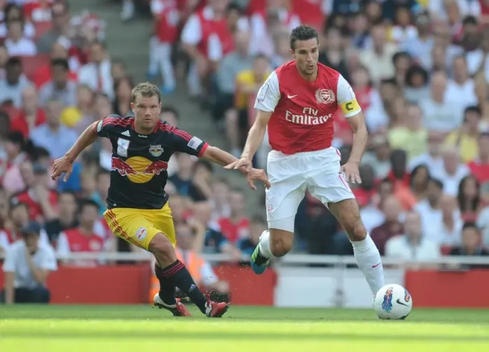 Framed Print : Arsenal's Robin van Persie Clashes with New York Red Bulls Teemu Tainio during the Emirates Cup Match, 2011 Framed Print : Arsenal's Robin van Persie Clashes with New York Red Bulls Teemu Tainio during the Emirates Cup Match, 2011