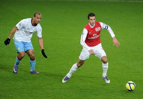 Arsenal's Robin van Persie Faces Off Against Aston Villa's Gabriel Agbonlahor in FA Cup Clash
