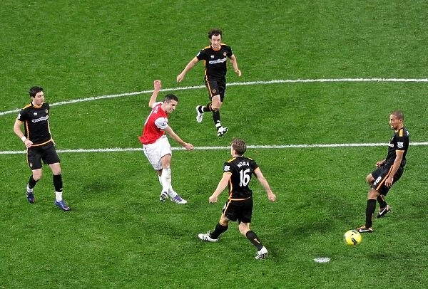Arsenal's Robin van Persie Faces Off Against Wolves Defenders During Premier League Clash