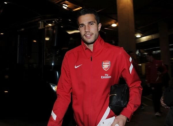 Arsenal's Robin van Persie Gears Up for Arsenal v Wigan Athletic in the Premier League