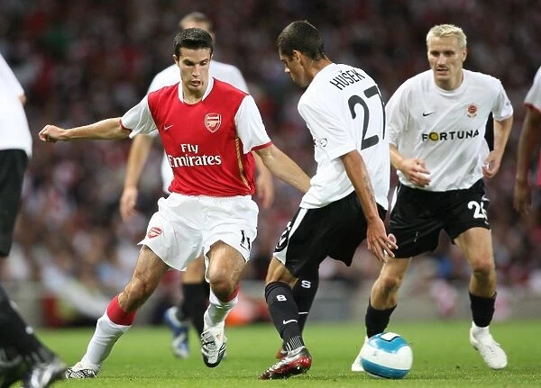 Arsenal's Robin van Persie Scores Three against Sparta's Lubos Husek in UEFA Champions League Match