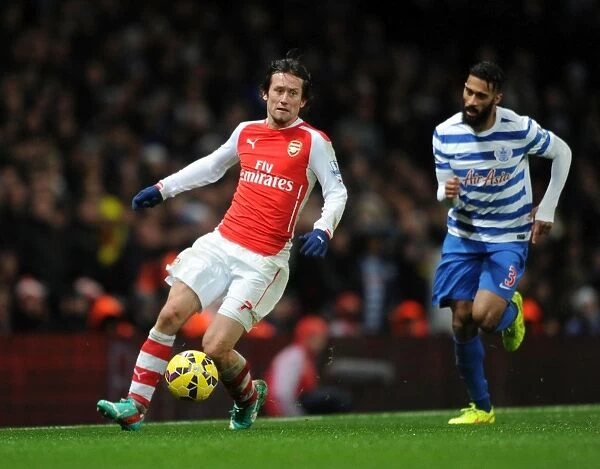Arsenal's Rosicky Clashes with QPR's Traore in Premier League Showdown