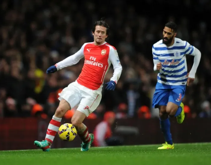 Framed Print : Arsenal's Rosicky Clashes with QPR's Traore in Premier League Showdown