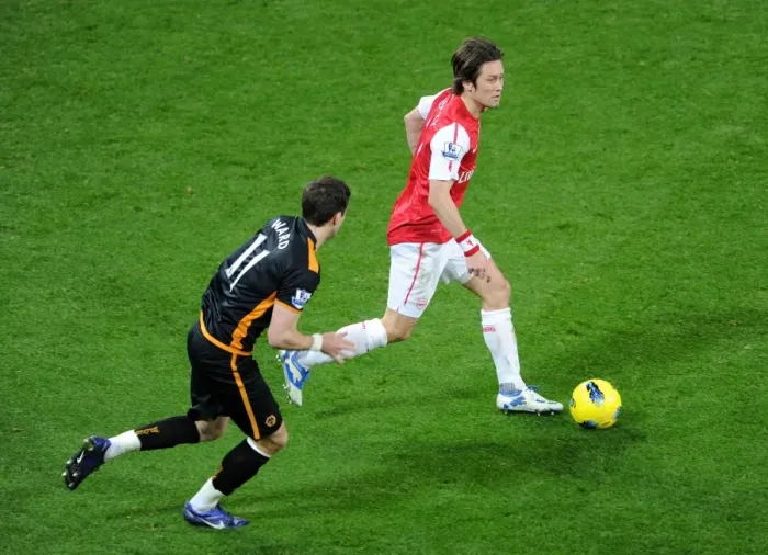 Framed Print : Arsenal's Rosicky Clashes with Wolves Ward in Premier League Showdown (2011-2012) Framed Print : Arsenal's Rosicky Clashes with Wolves Ward in Premier League Showdown (2011-2012)