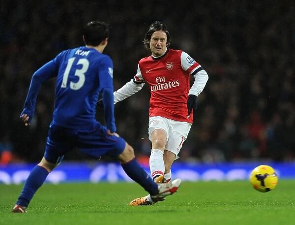 Arsenal's Rosicky Faces Off Against Cardiff's Kim Bo-Kyung in Premier League Clash