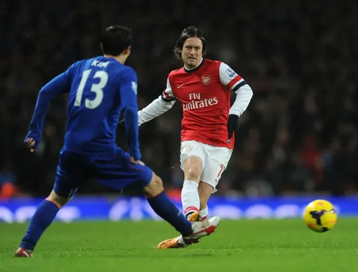 Framed Print : Arsenal's Rosicky Faces Off Against Cardiff's Kim Bo-Kyung in Premier League Clash Framed Print : Arsenal's Rosicky Faces Off Against Cardiff's Kim Bo-Kyung in Premier League Clash