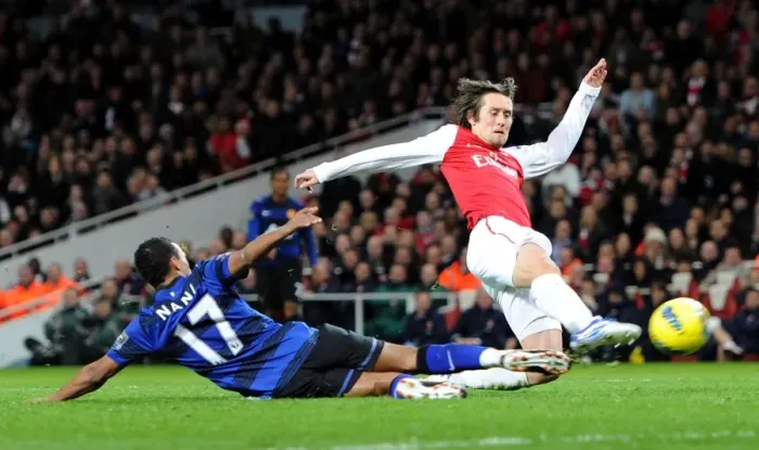 Framed Print : Arsenal's Rosicky Faces Off Against Manchester United's Nani in Intense Premier League Showdown Framed Print : Arsenal's Rosicky Faces Off Against Manchester United's Nani in Intense Premier League Showdown