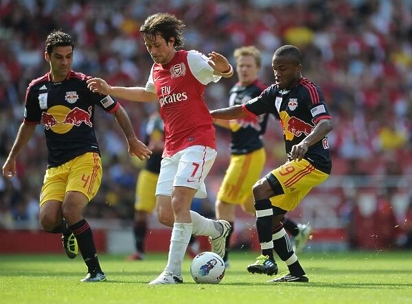 Arsenal's Rosicky Faces Off Against Marquez and Richards of New York Red Bulls during the 2011-12 Emirates Cup