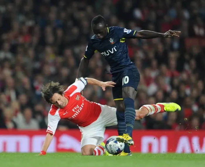 Framed Print : Arsenal's Rosicky Faces Off Against Southampton's Mane in League Cup Clash Framed Print : Arsenal's Rosicky Faces Off Against Southampton's Mane in League Cup Clash