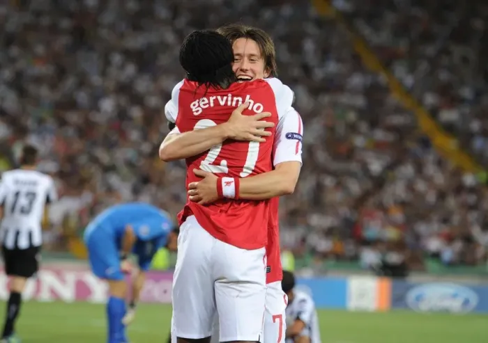 Framed Print : Arsenal's Rosicky and Gervinho Celebrate Robin van Persie's Goal in Udinese Clash (Udinese v Arsenal 2011-12, UEFA Champions League)