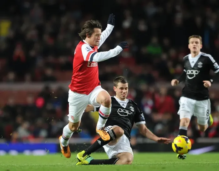 Framed Print : Arsenal's Rosicky Leaps Past Southampton's Schneiderlin (2013-14)