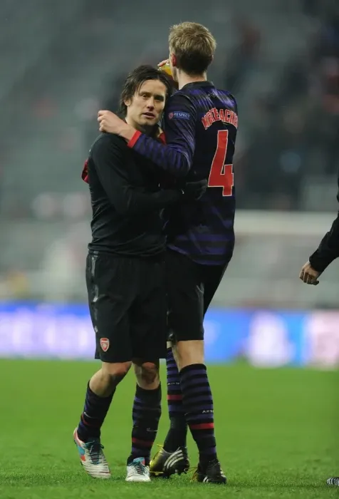 Framed Print : Arsenal's Rosicky and Mertesacker: Defeated Faces after Bayern Munich Clash in Champions League