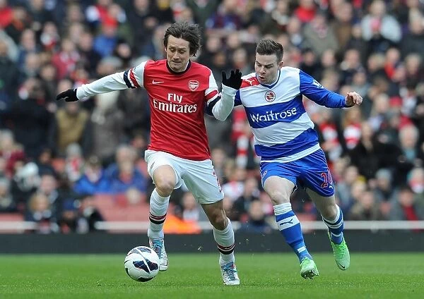 Arsenal's Rosicky Outsmarts Guthrie: A Premier League Showdown