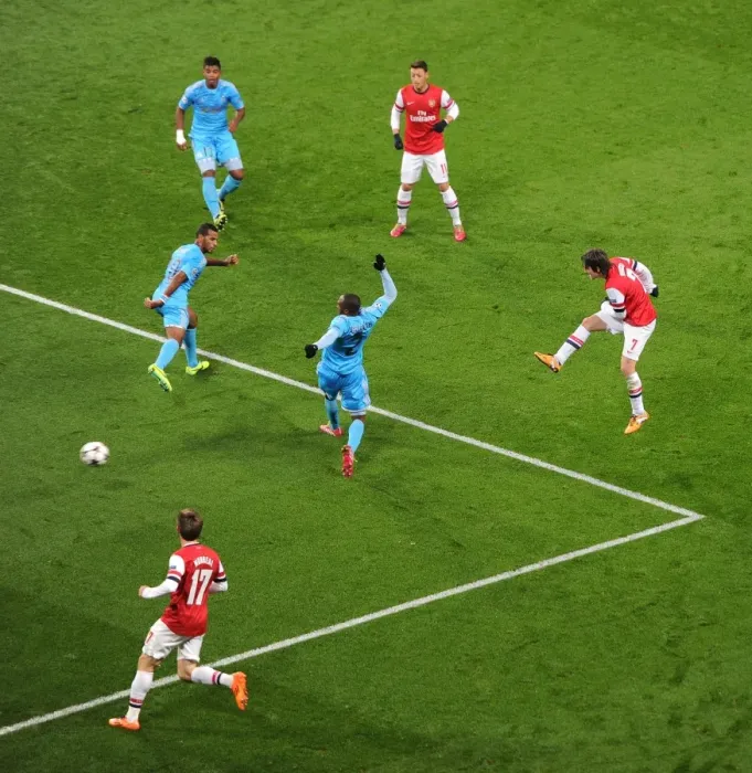 Framed Print : Arsenal's Rosicky Scores Past Marseille's Koulou and Abdallah in 2013-14 Champions League