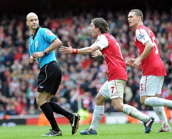Arsenal's Rosicky and Vermaelen Protest Referee Decision During Arsenal v Norwich City Match, 2011-12 Season