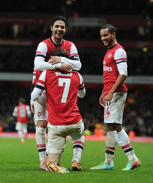 Arsenal's Rosicky and Walcott Celebrate Goal Against Tottenham in FA Cup Third Round
