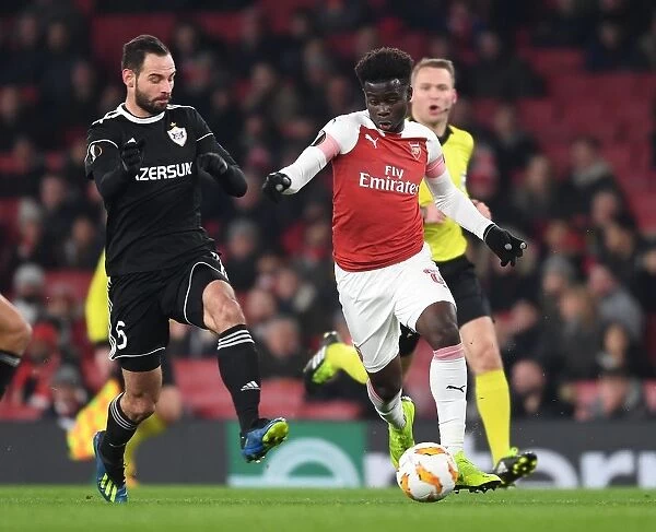 Arsenal's Saka Dashes Past Qarabag's Huseynov in Europa League Clash