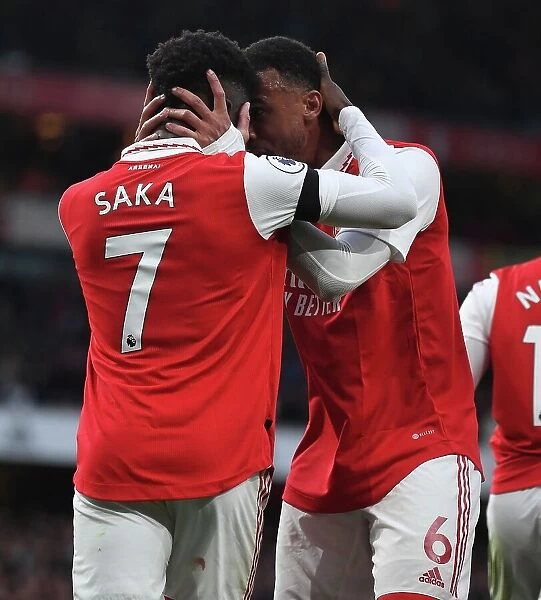 Arsenal's Saka and Gabriel in Action: A Battle at Emirates Stadium, Arsenal vs. Brentford, Premier League 2022-23