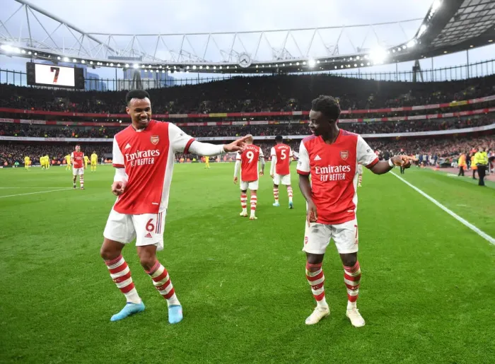 Framed Print : Arsenal's Saka and Gabriel: Celebrating a Glorious Second Goal Against Brentford (2021-22)