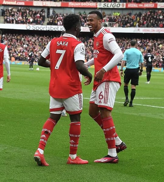 Arsenal's Saka and Gabriel: Double Trouble - Celebrating a Winning Duo Against Crystal Palace (2022-23)