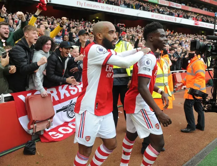 Framed Print : Arsenal's Saka and Lacazette: Celebrating a Goal Against Manchester City (2021-22) Framed Print : Arsenal's Saka and Lacazette: Celebrating a Goal Against Manchester City (2021-22)