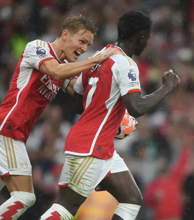 Framed Print : Arsenal's Saka and Odegaard Celebrate First Goal vs. Fulham in 2023-24 Premier League