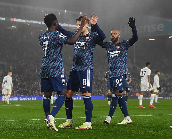 Arsenal's Saka, Odegaard, and Lacazette: Celebrating Goals Against Leeds United (December 2021)