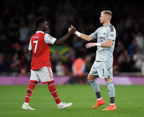 Arsenal's Saka and Ramsdale Celebrate Victory over Aston Villa in 2022-23 Premier League