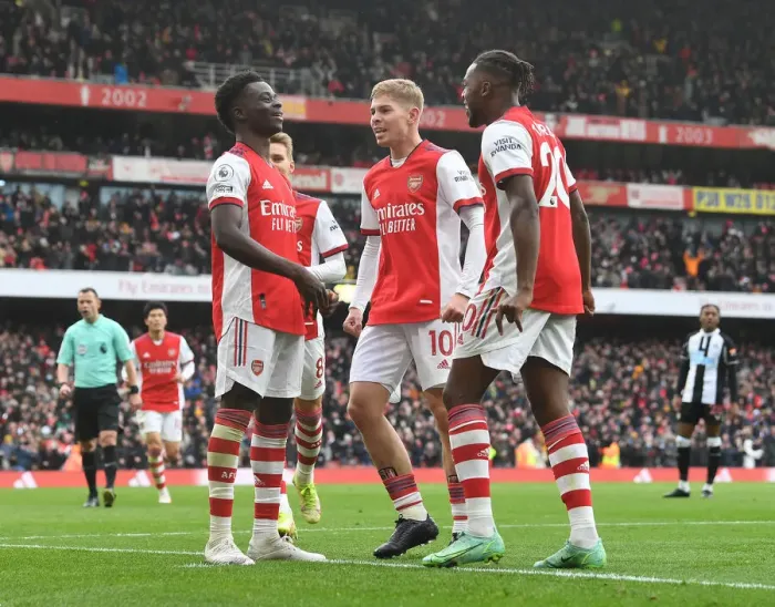 Framed Print : Arsenal's Saka, Smith Rowe, and Tavares Celebrate First Goal vs. Newcastle United (2021-22)