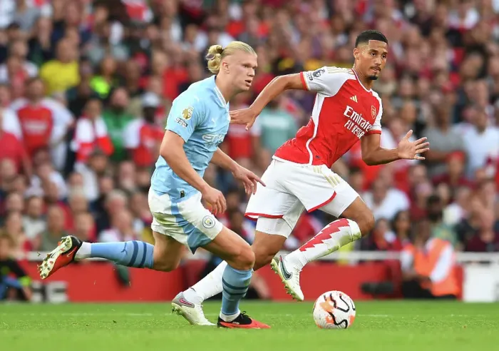 Framed Print : Arsenal's Saliba Faces Haaland Pressure: Arsenal FC vs Manchester City, 2023-24 Premier League