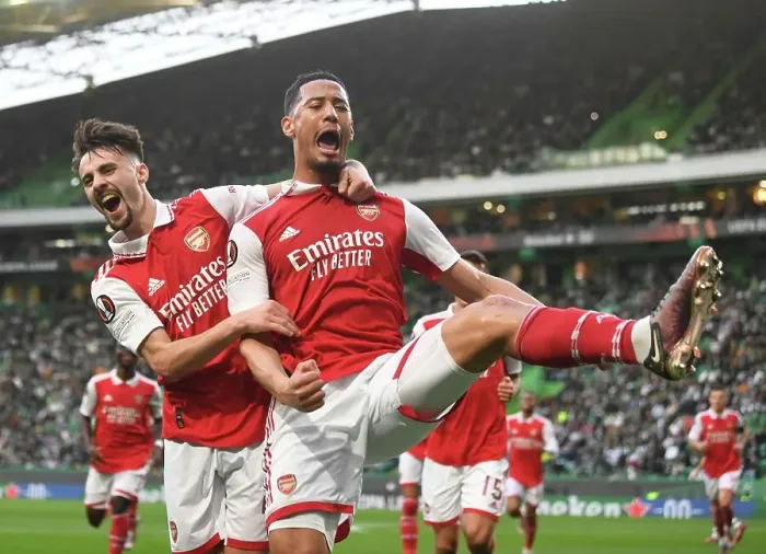 Framed Print : Arsenal's Saliba and Vieira: Celebrating Their First Goal in Europa League Victory over Sporting Lisbon