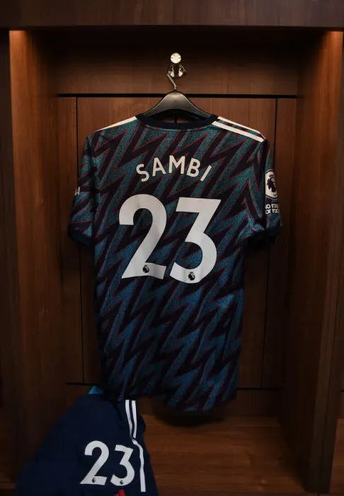 Framed Print : Arsenal's Sambi Lokonga Jersey in Brentford Changing Room - Premier League 2021-22