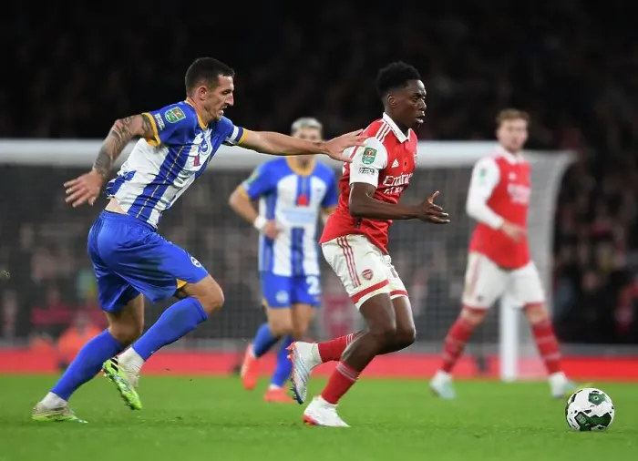 Framed Print : Arsenal's Sambi Outmaneuvers Brighton's Dunk in Carabao Cup Clash Framed Print : Arsenal's Sambi Outmaneuvers Brighton's Dunk in Carabao Cup Clash