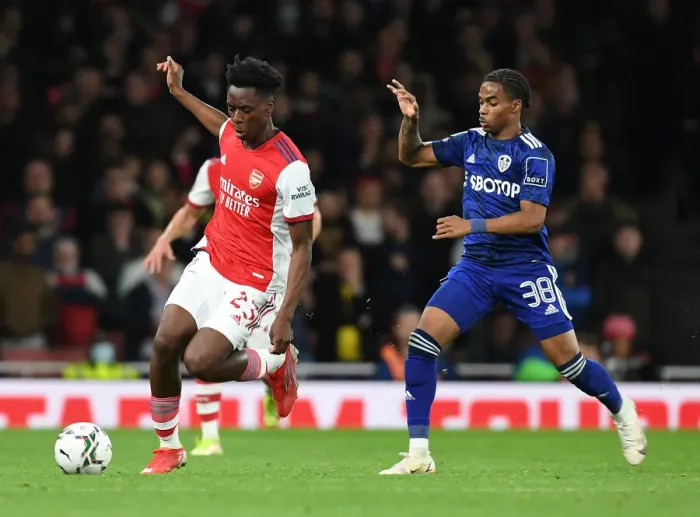 Framed Print : Arsenal's Sambi Outmaneuvers Leeds Summerville in Carabao Cup Clash Framed Print : Arsenal's Sambi Outmaneuvers Leeds Summerville in Carabao Cup Clash